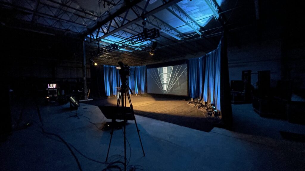 Video Screen design inside a warehouse with event lighting