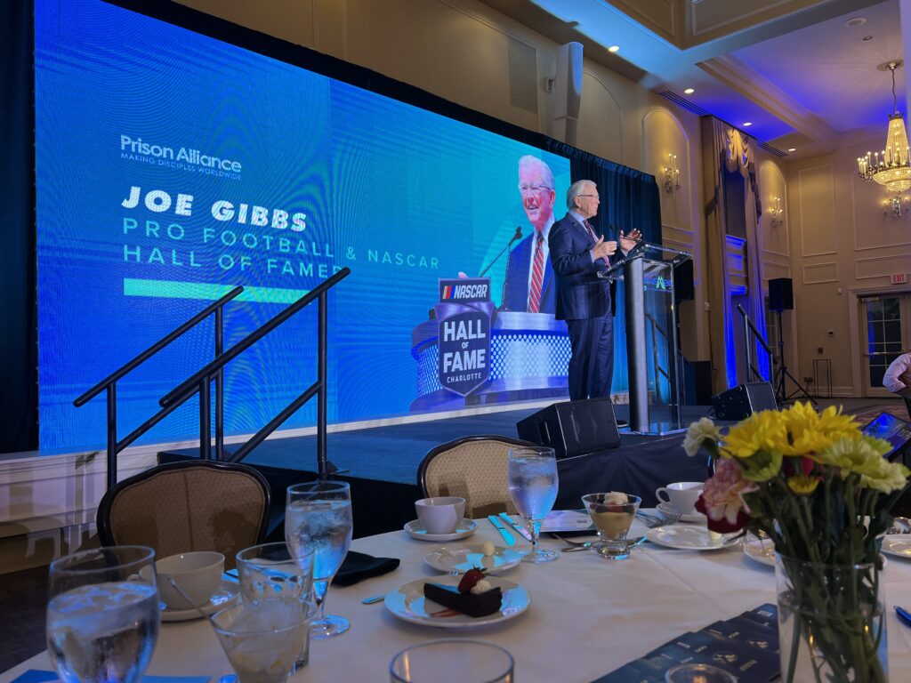 LED wall showcasing Joe Gibbs at North Ridge Country Club Raleigh